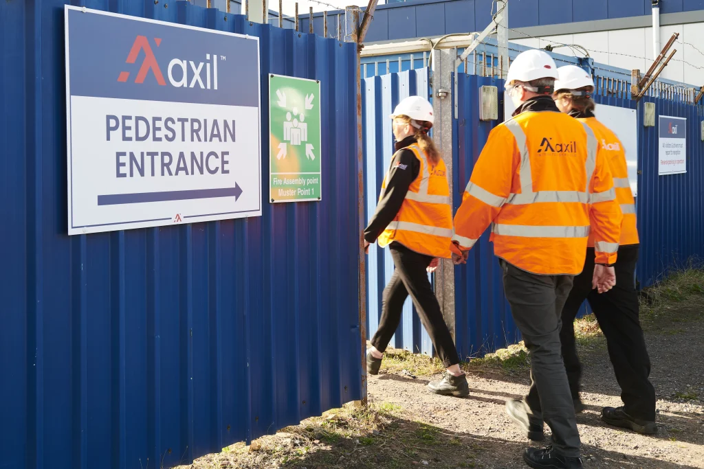 Axil staff in PPE, walking into out Cannock site 