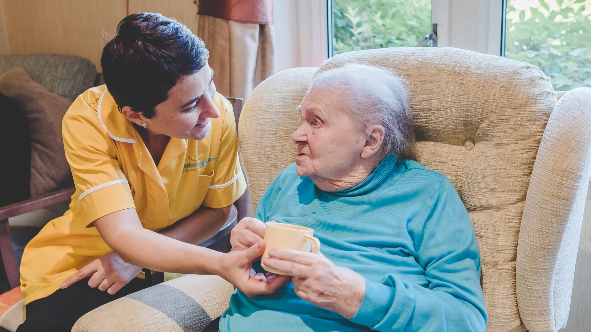 Peterborough Care staff and lady