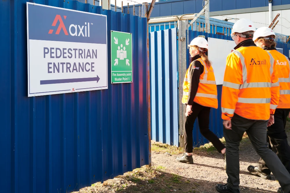 Axil employees walking into Axil