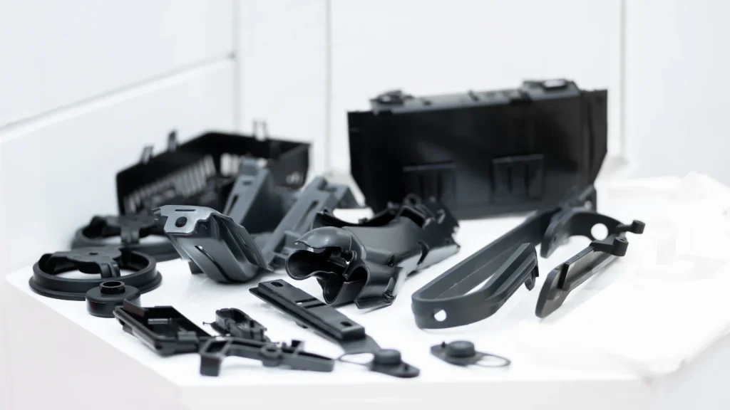 Plastic and rubber parts of automotive manufacturing by high precision mold injection in the industrial factory